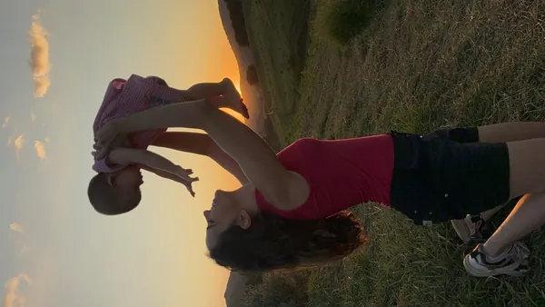 Aline com a filha